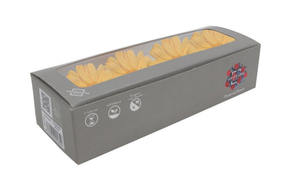 Warm yellow gerbera head in a box