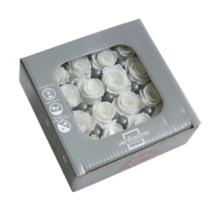 Sixteen white mini rose heads in a box